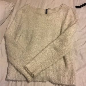 White furry sweater